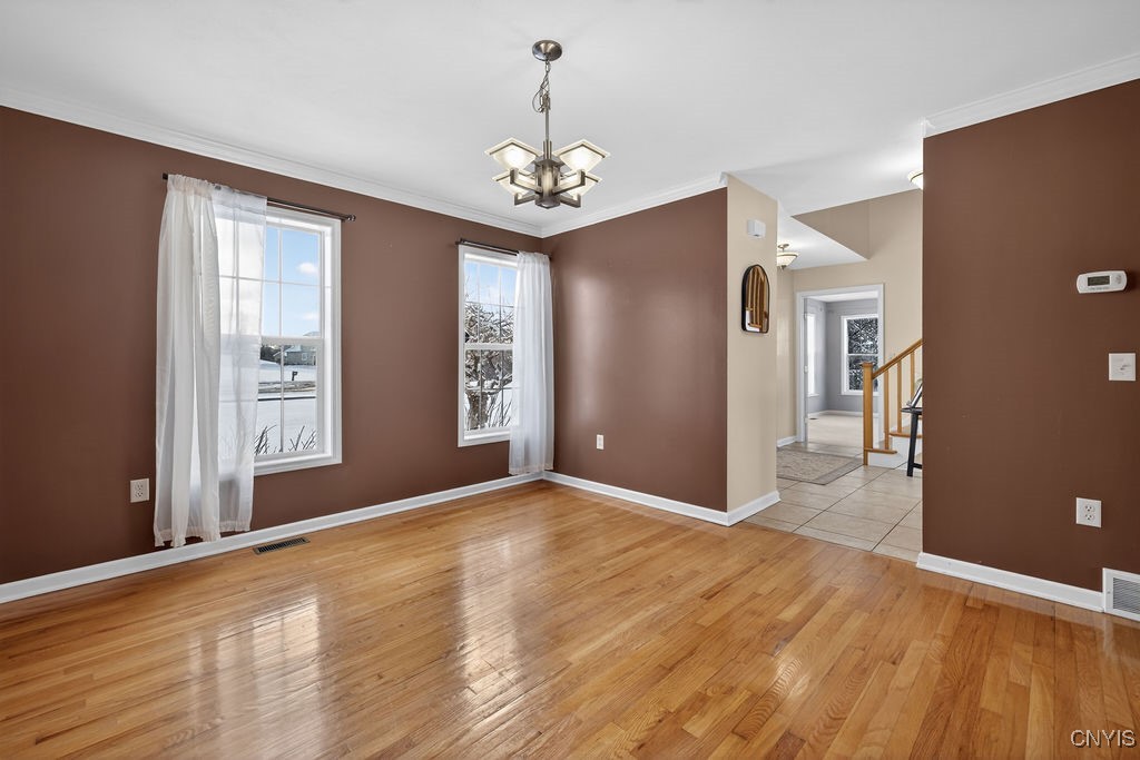4326 Chilmark Street Marcellus, NY 13108 - Photo 27 of 49 Formal dining room with hardwood floors and large