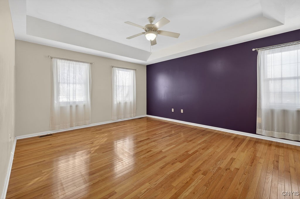 4326 Chilmark Street Marcellus, NY 13108 - Photo 37 of 49 Primary suite with natural light, tray ceiling, ce