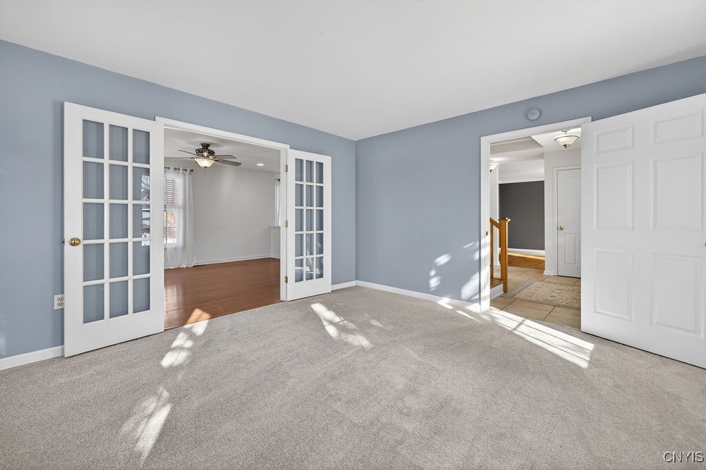 4326 Chilmark Street Marcellus, NY 13108 - Photo 9 of 49 Front living room with french doors that lead to t