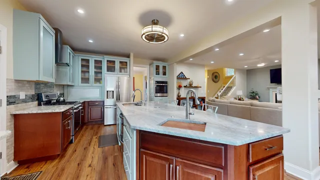 a living room with furniture or couch and a flat screen tv