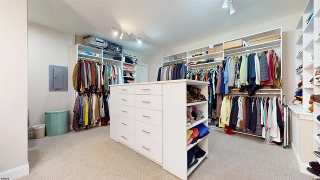 a room with gym equipment and a flat screen tv