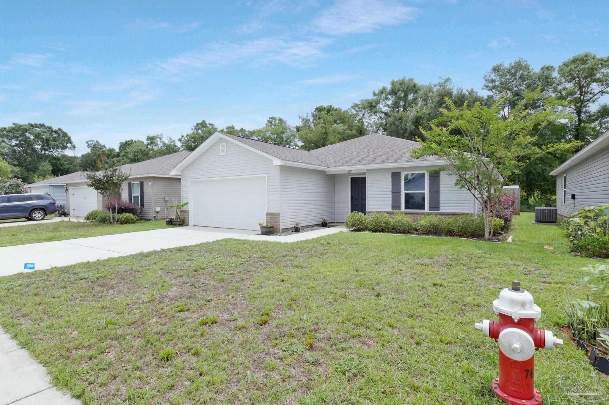 1625 Addies Way Pensacola, FL 32534 - Photo 48 of 50 a house with huge green field in front of it