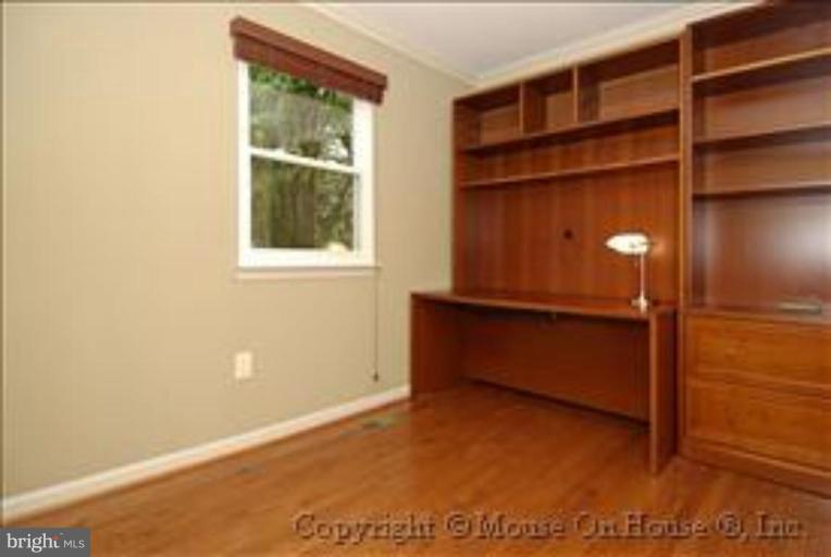 1826 Post Oak Trail Reston, VA 20191 - Photo 14 of 28 a view of an empty room with a window