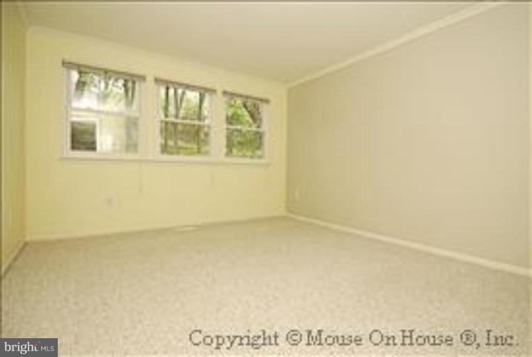 1826 Post Oak Trail Reston, VA 20191 - Photo 19 of 28 a view of an empty room with a window