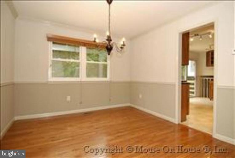 1826 Post Oak Trail Reston, VA 20191 - Photo 5 of 28 a view of an empty room with a window