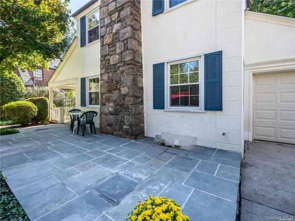 a view of a house with a patio