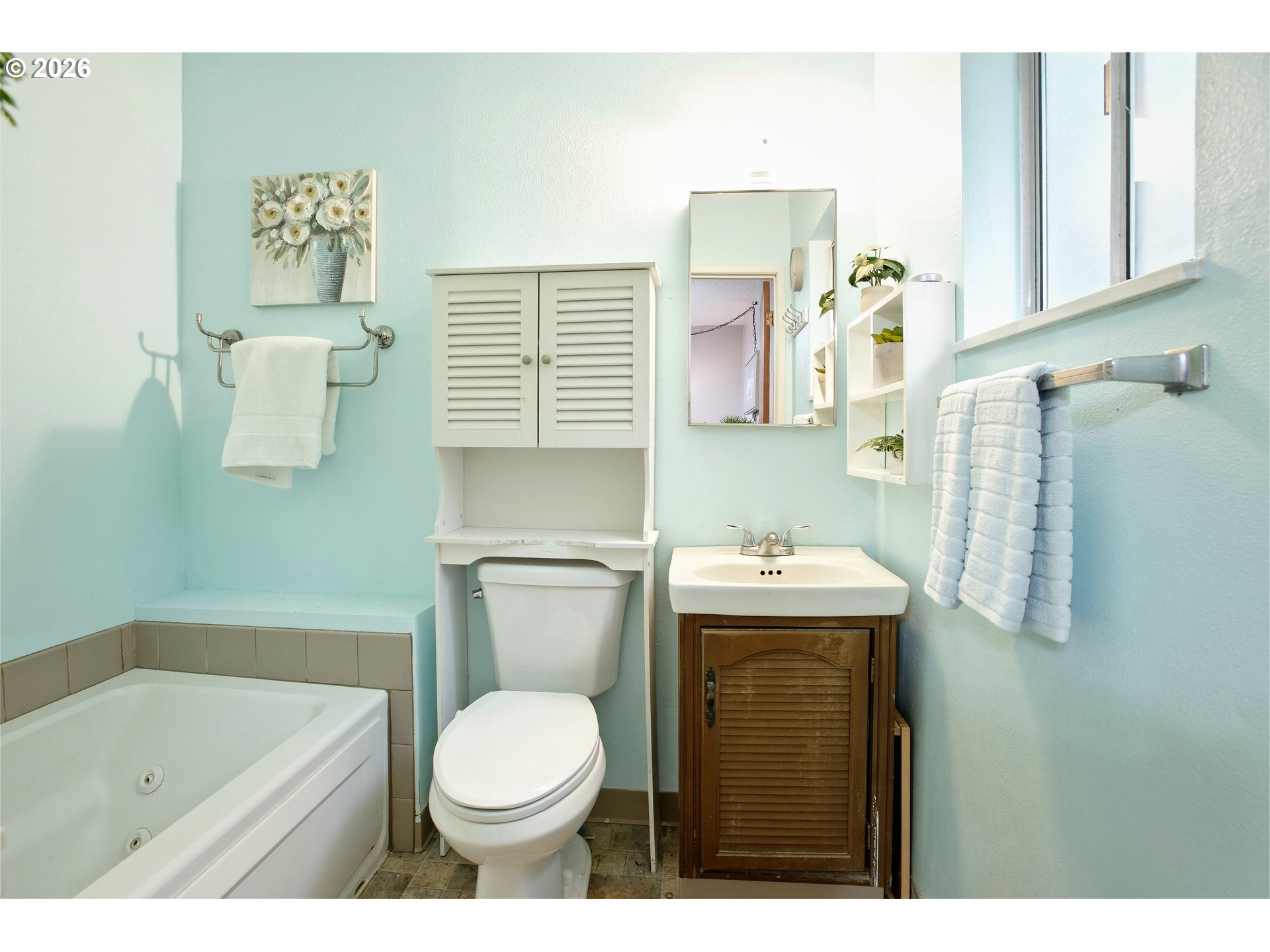 3506 Columbia Heights Road Longview, WA 98632 - Photo 13 of 21 a bathroom with a sink toilet and shower