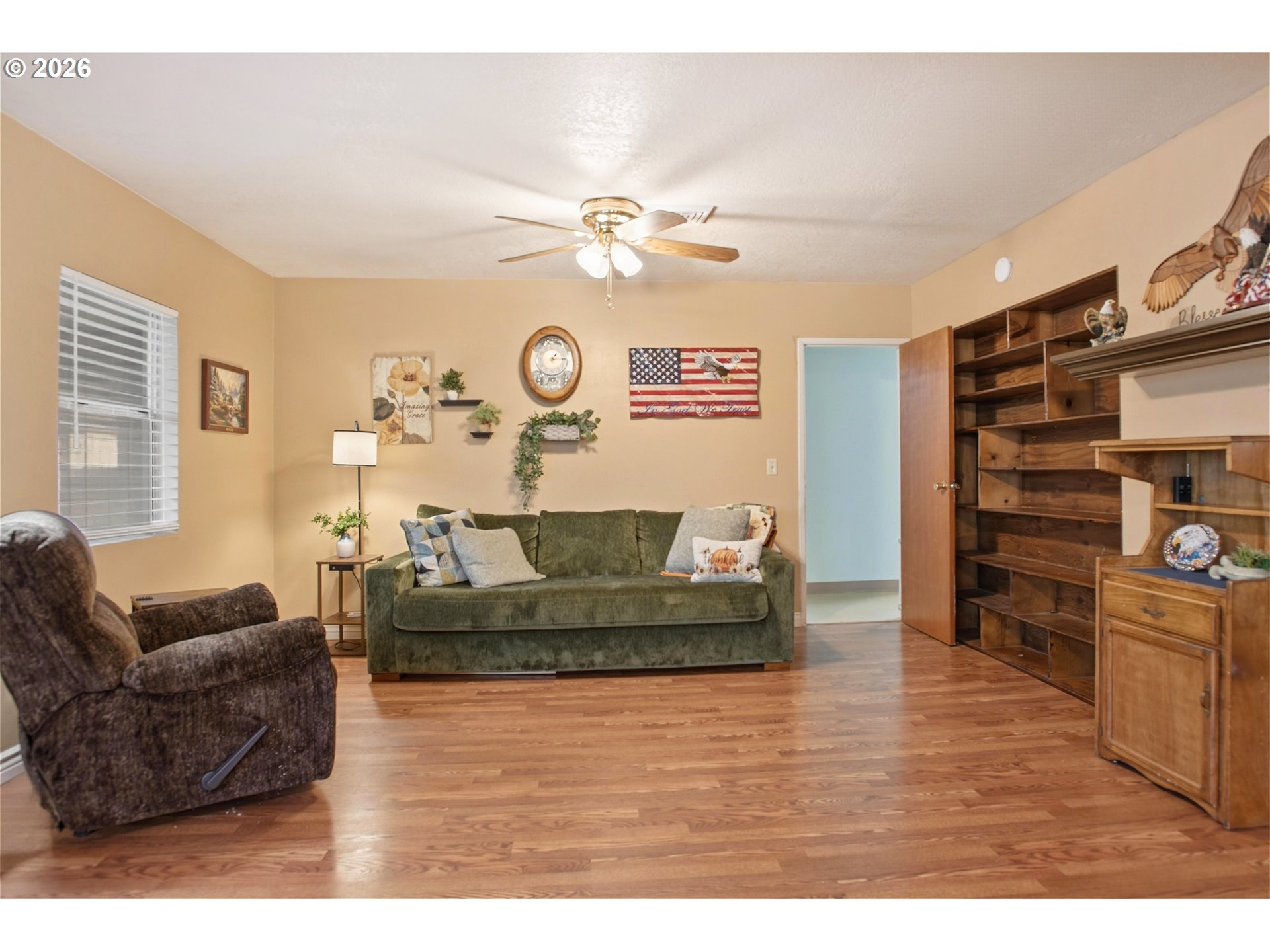 3506 Columbia Heights Road Longview, WA 98632 - Photo 6 of 21 a living room with furniture and a flat screen tv