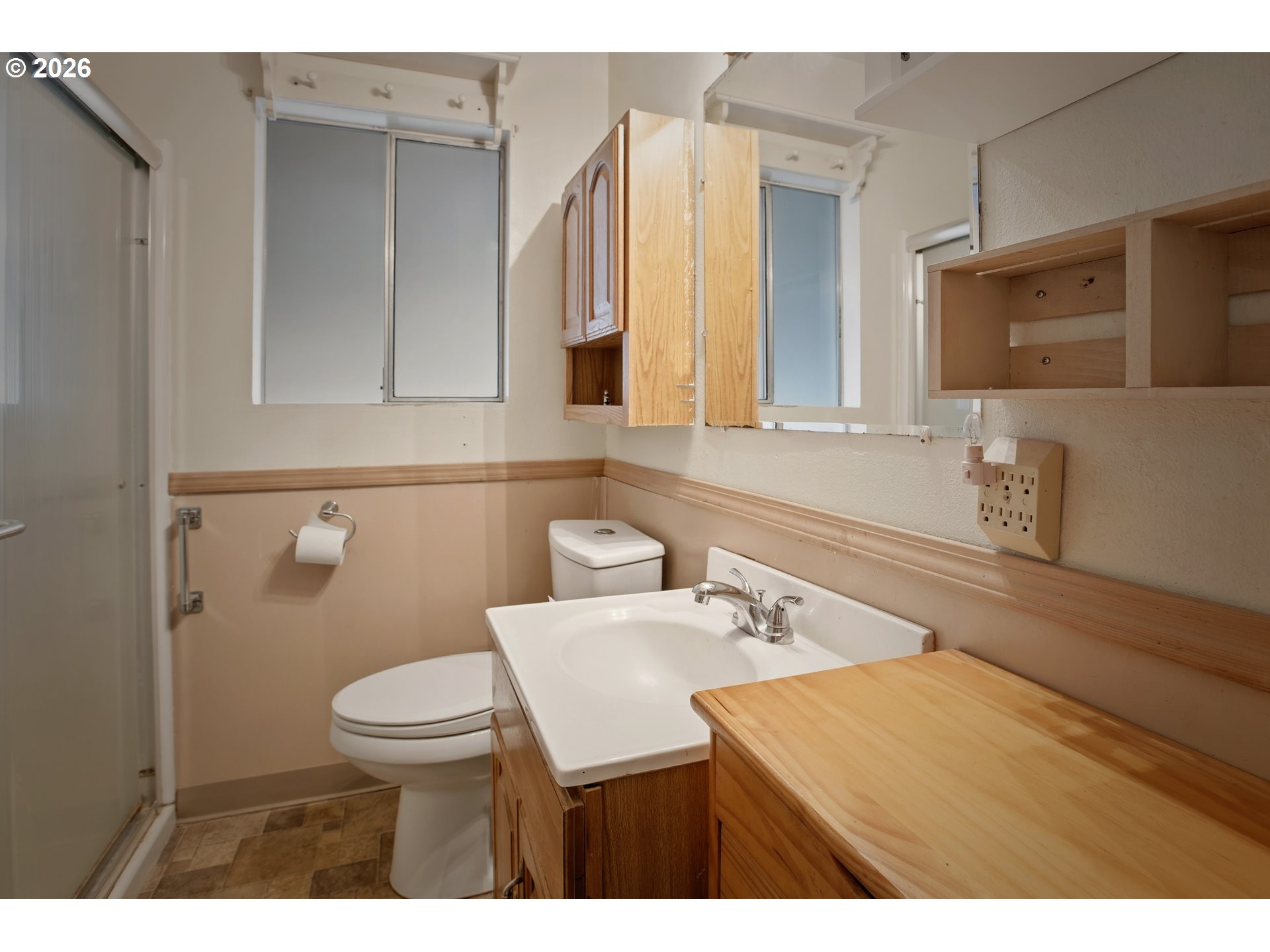3506 Columbia Heights Road Longview, WA 98632 - Photo 10 of 21 a bathroom with a sink a toilet and mirror
