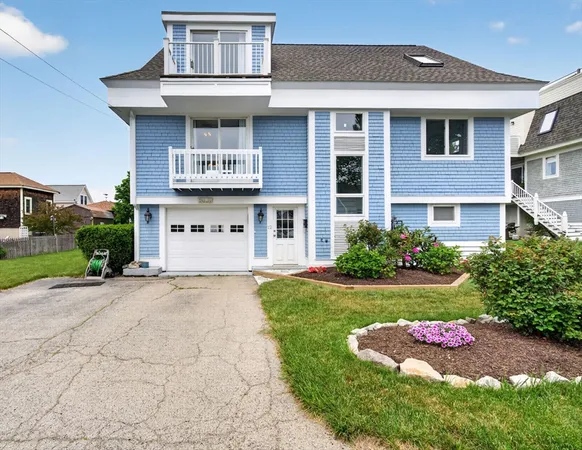 a front view of a house with a yard and outdoor space