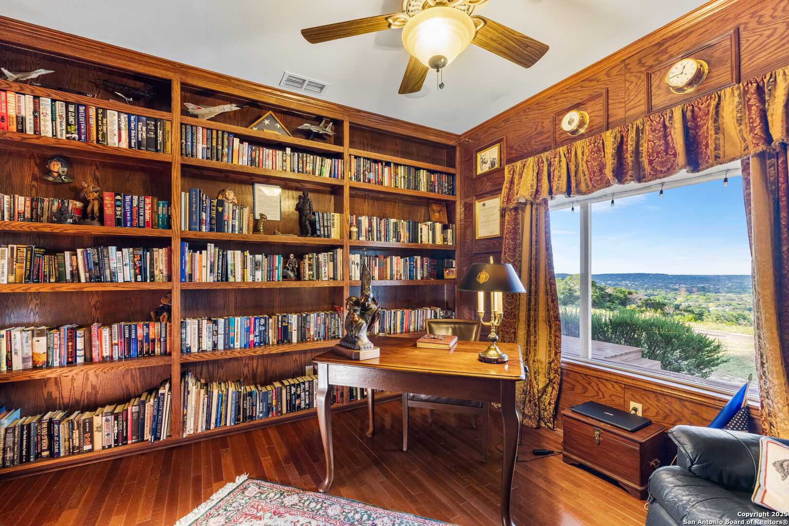 247 Huntleigh Road South Ingram, TX 78025 - Photo 22 of 41 a reading room with furniture book shelf and a dining table