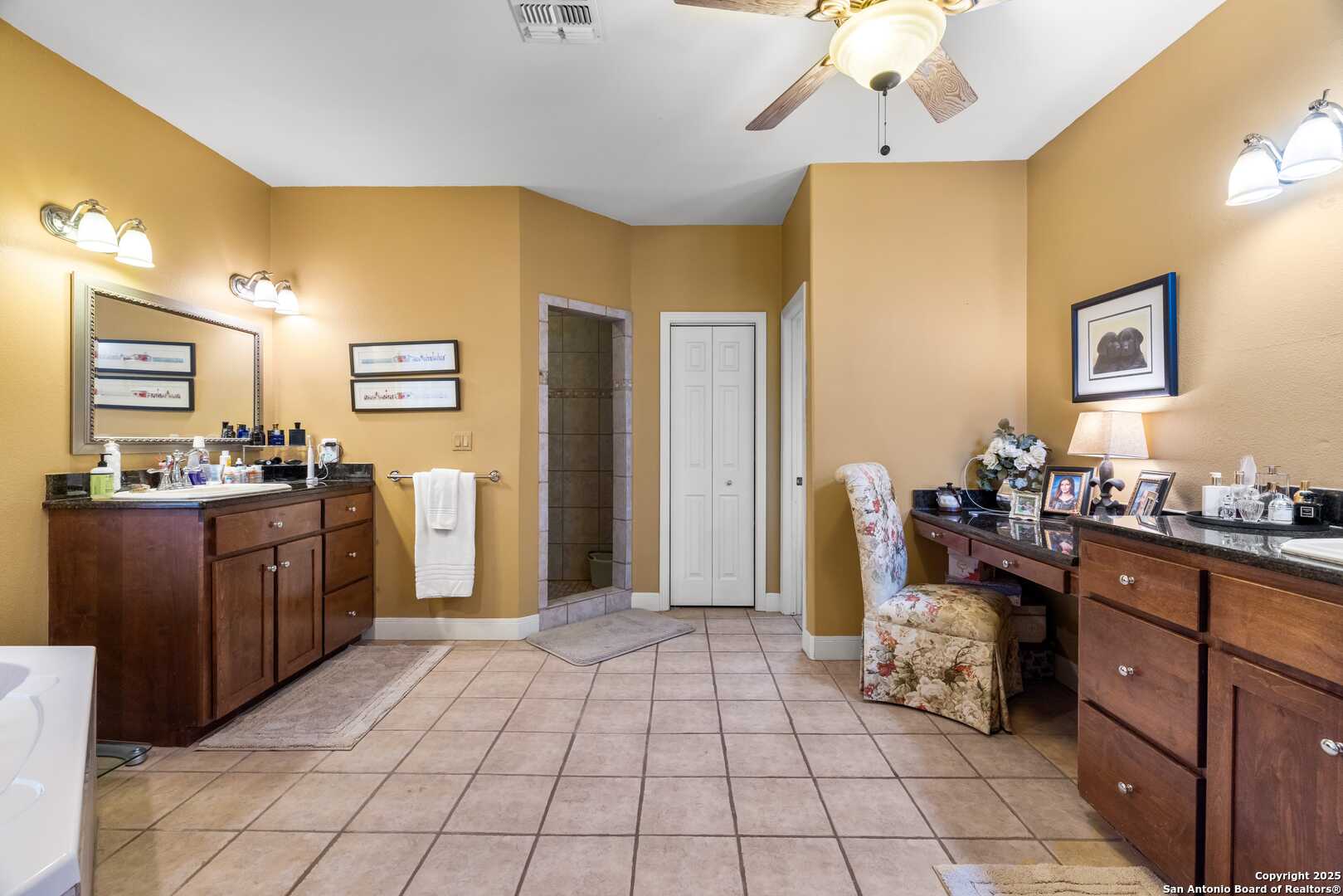 247 Huntleigh Road South Ingram, TX 78025 - Photo 26 of 41 a kitchen with stainless steel appliances granite countertop a refrigerator and a sink