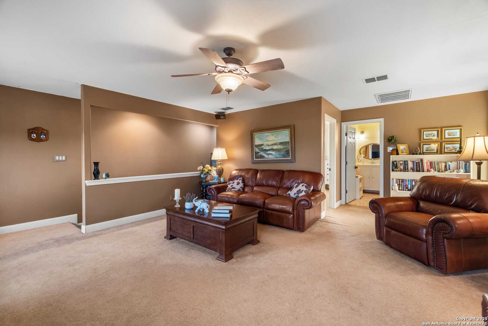 247 Huntleigh Road South Ingram, TX 78025 - Photo 30 of 41 a living room with furniture and a flat screen tv