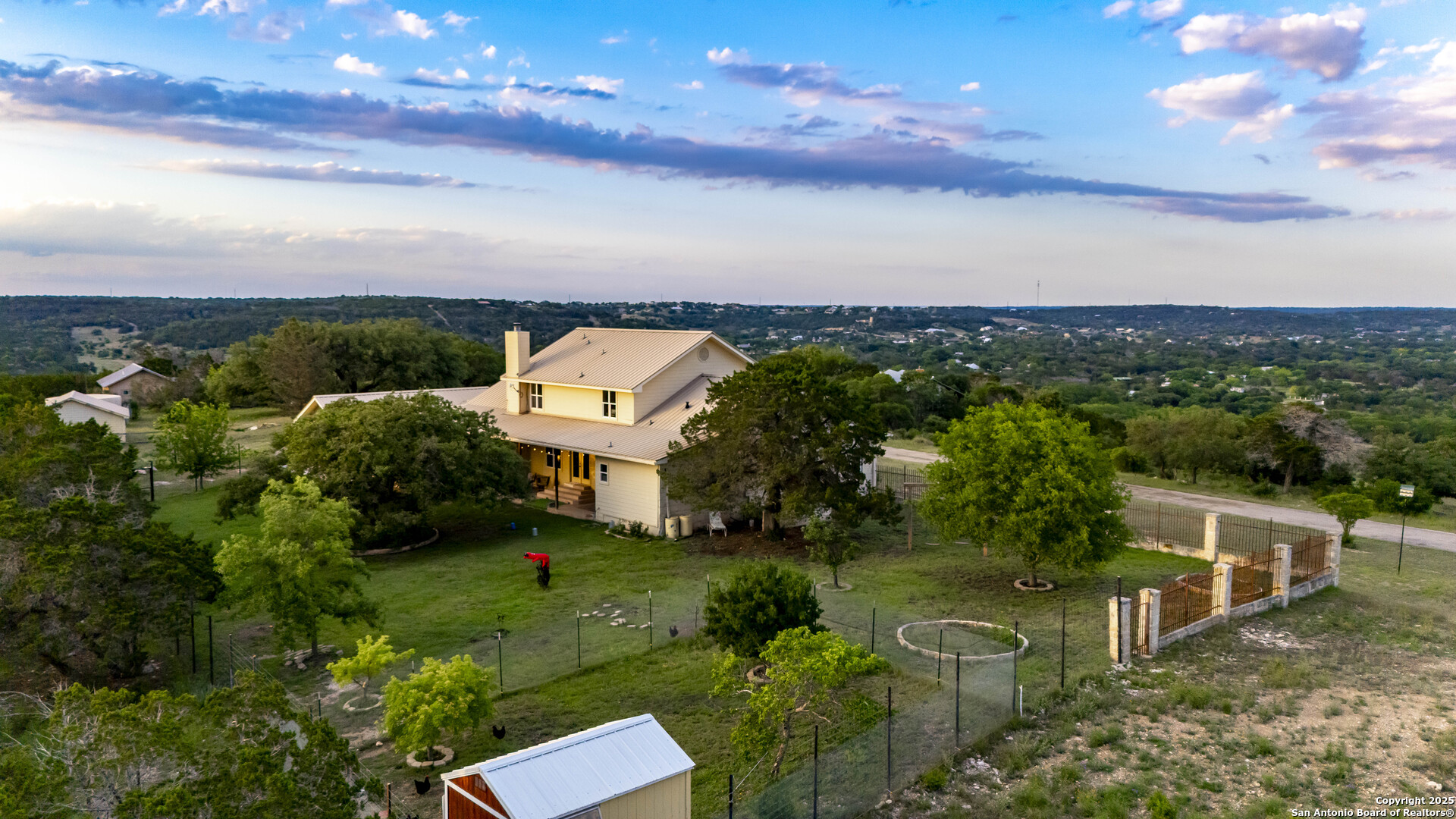 247 Huntleigh Road South Ingram, TX 78025 - Photo 4 of 41 an aerial view of a house with a yard