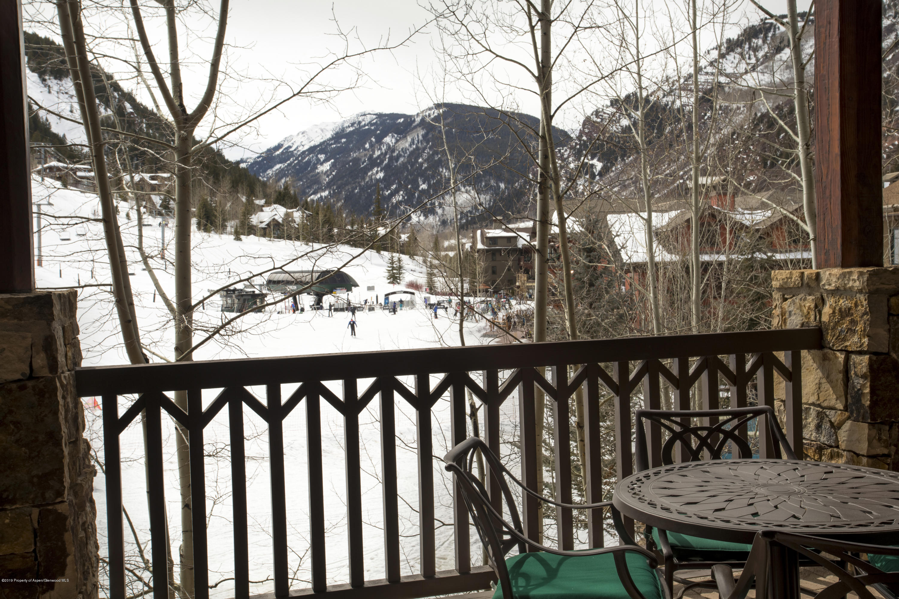 197 Prospector Road, Unit 2204 WINTER INTEREST 1 Aspen, CO 81611 - Photo 23 of 25 a view of a wooden roof deck