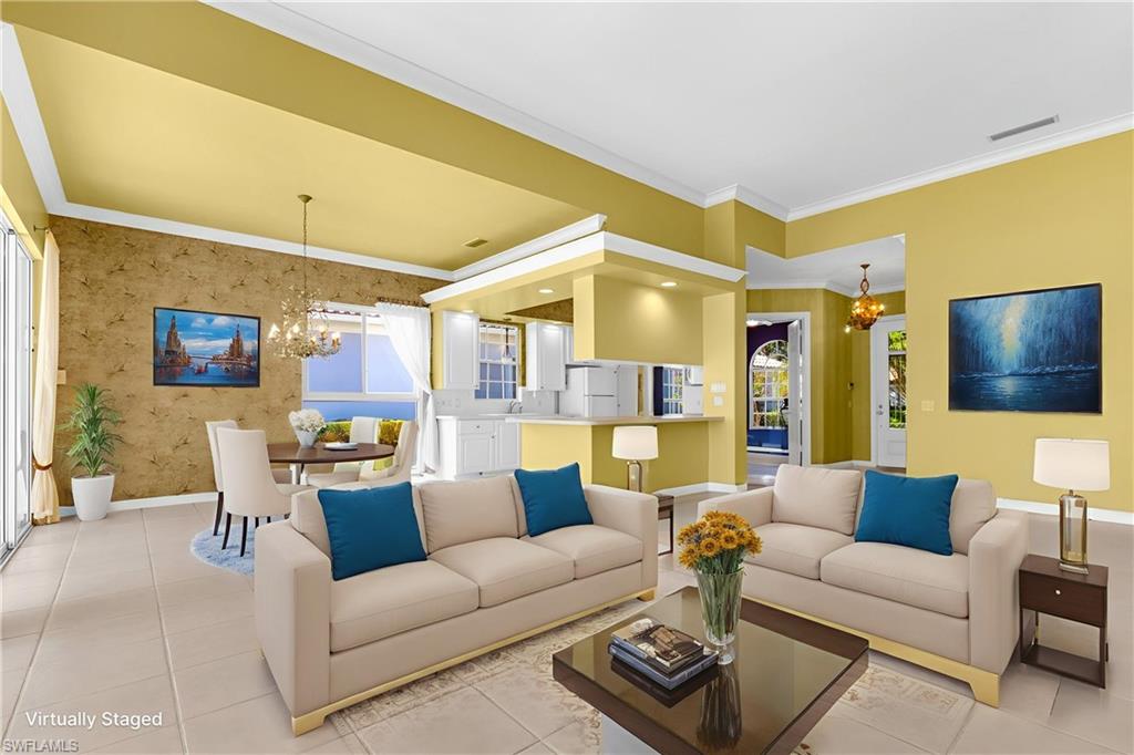 3790 Whidbey Way Naples, FL 34119 - Photo 10 of 49 a living room with furniture and a flat screen tv