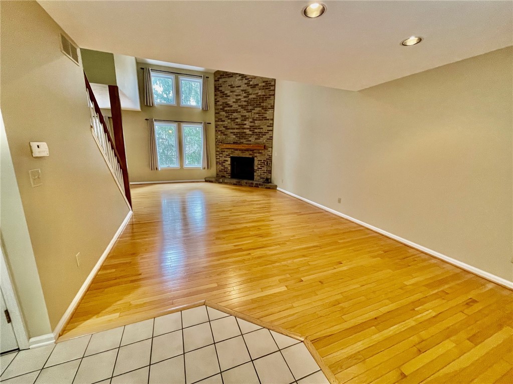 48 Colonial Circle Perinton, NY 14450 - Photo 4 of 50 Foyer to Great Room