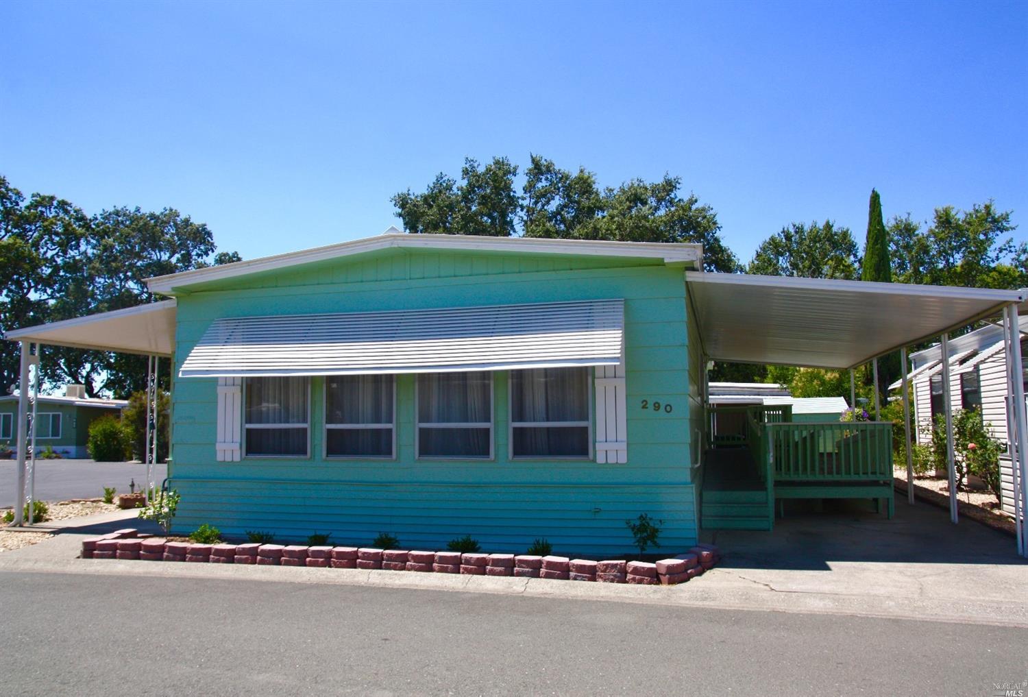 Welcome to 290 Colonial Park Drive. Situated on the corner of a court, this home offers privacy and outdoor space to garden and relax. Note the beautiful ramp on the carport side of the home.