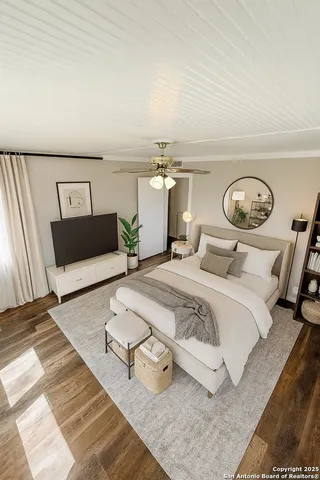 a bedroom with a bed and lamp