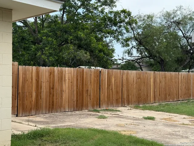 a view of wooden fence