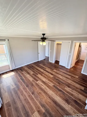 a view of an empty room and window