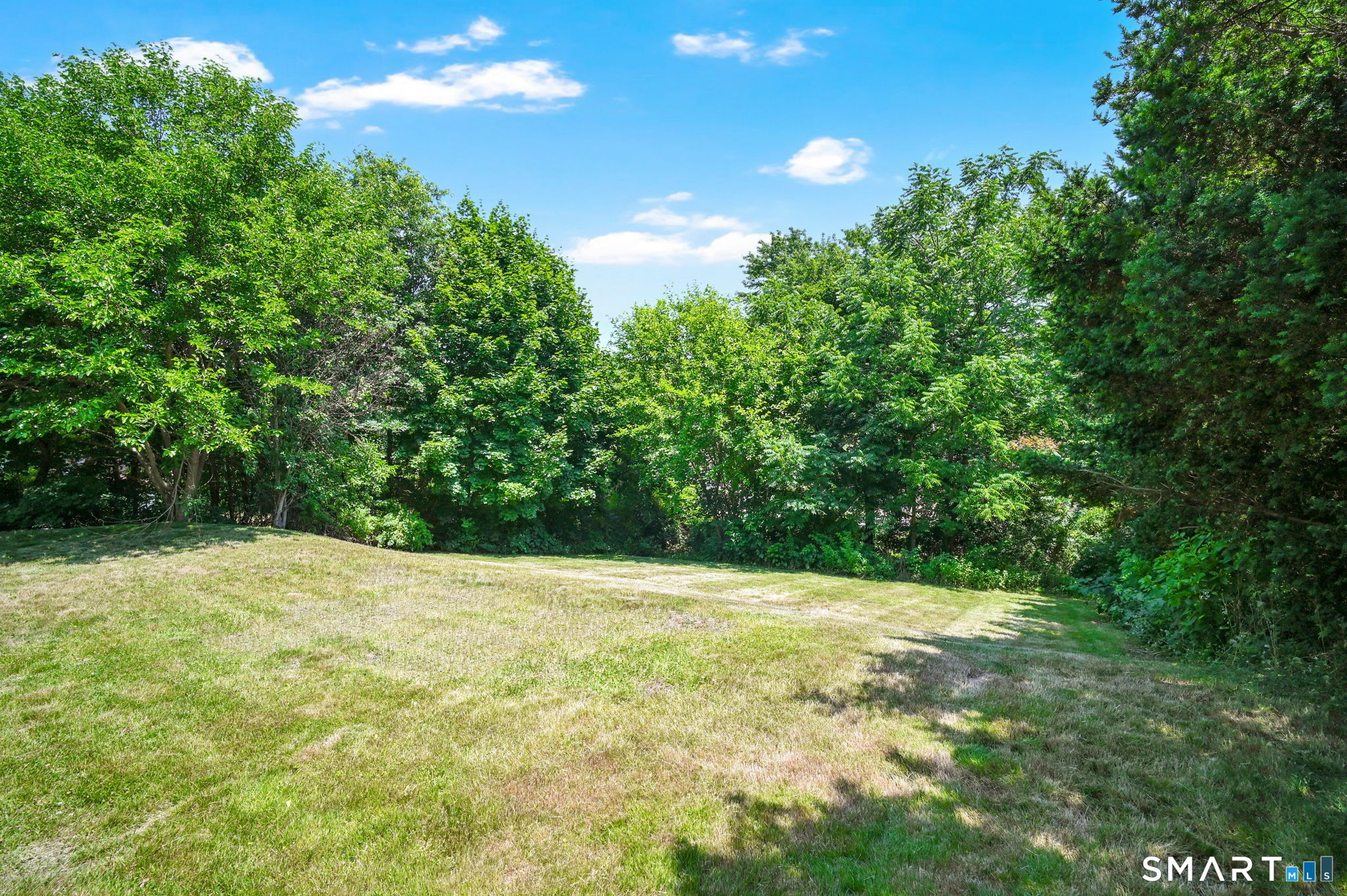 7 Rogers Drive Meriden, CT 06450 - Photo 7 of 40 a view of an outdoor space with a lake view