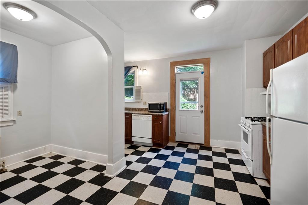 1436 Davis Avenue Pittsburgh, PA 15212 - Photo 11 of 29 a black and white checkered floor with a black white checkered floor