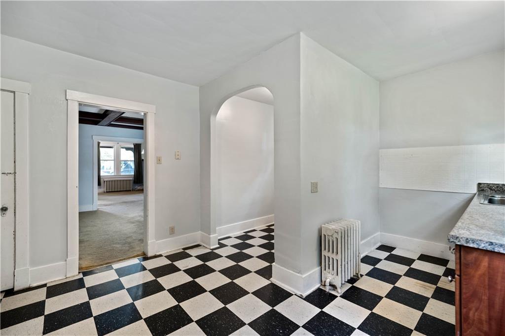 1436 Davis Avenue Pittsburgh, PA 15212 - Photo 14 of 29 a black and white checkered floor with a black white checkered floor