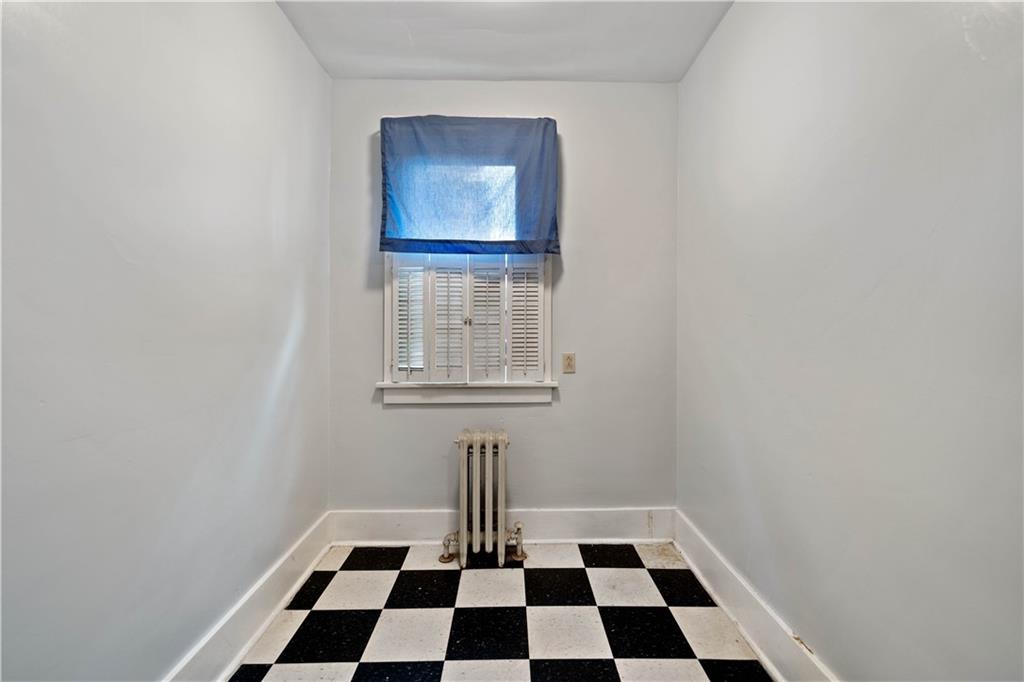 1436 Davis Avenue Pittsburgh, PA 15212 - Photo 15 of 29 a black and white checkered floor with a black white checkered floor