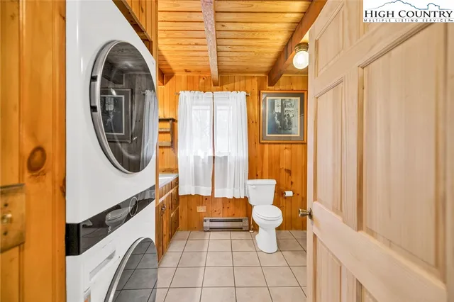 a bathroom with a sink a mirror and a toilet