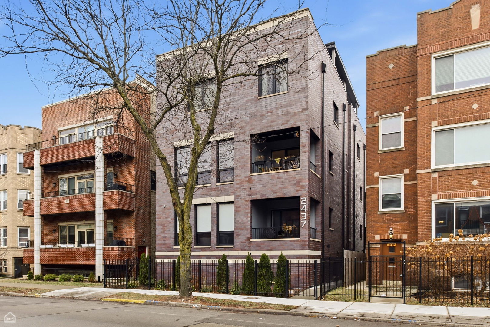 a front view of a building with street view