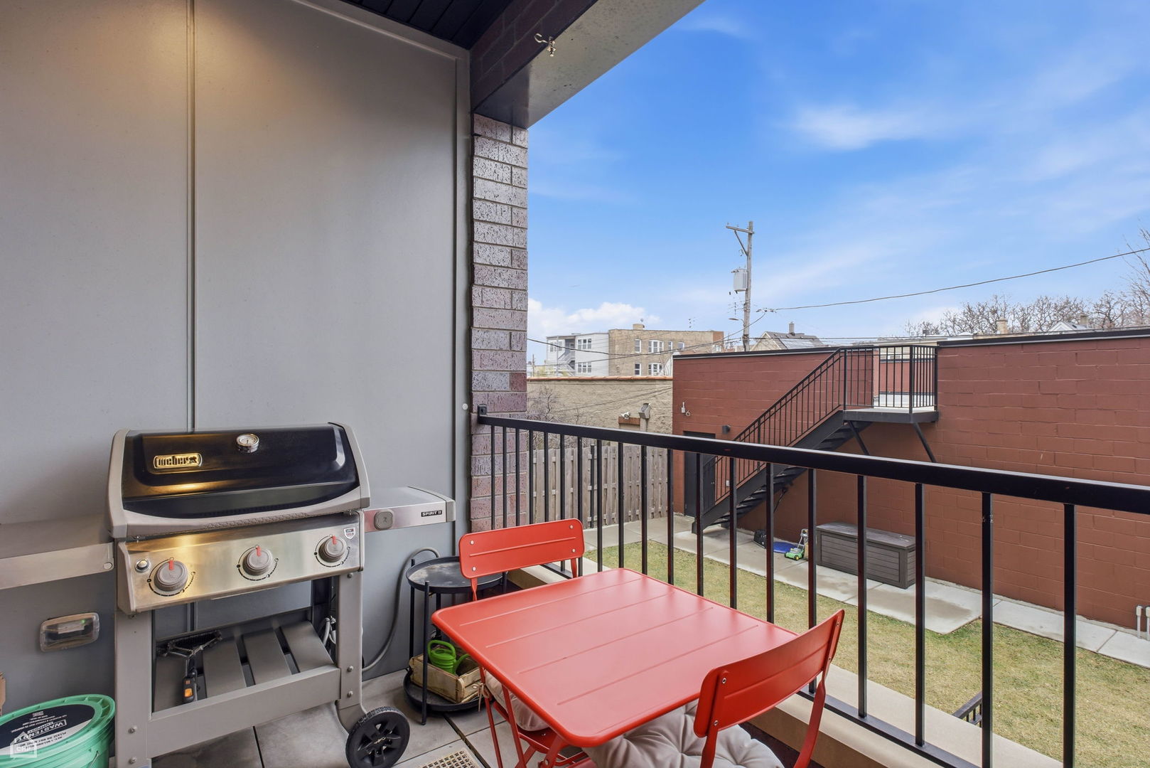Undisclosed Address Chicago, IL 60625 - Photo 12 of 25 a bedroom with a bed and a desk