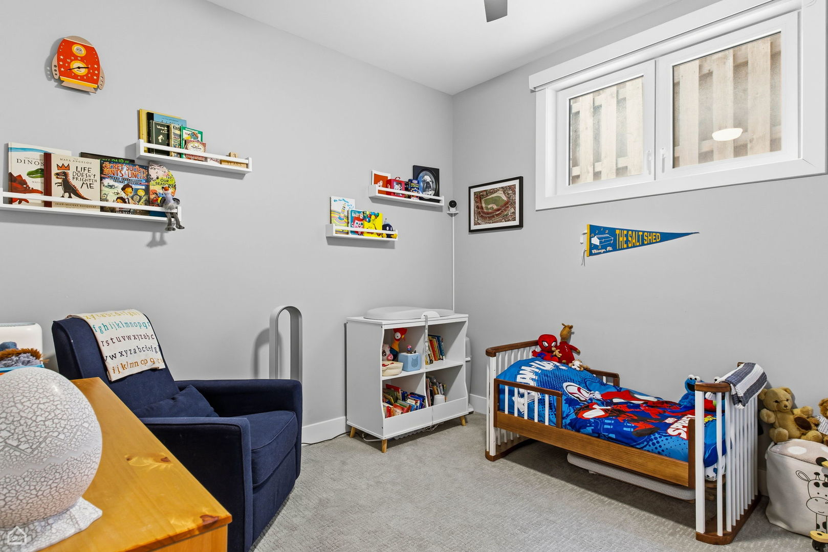 Undisclosed Address Chicago, IL 60625 - Photo 18 of 25 a bedroom with toys and a couch