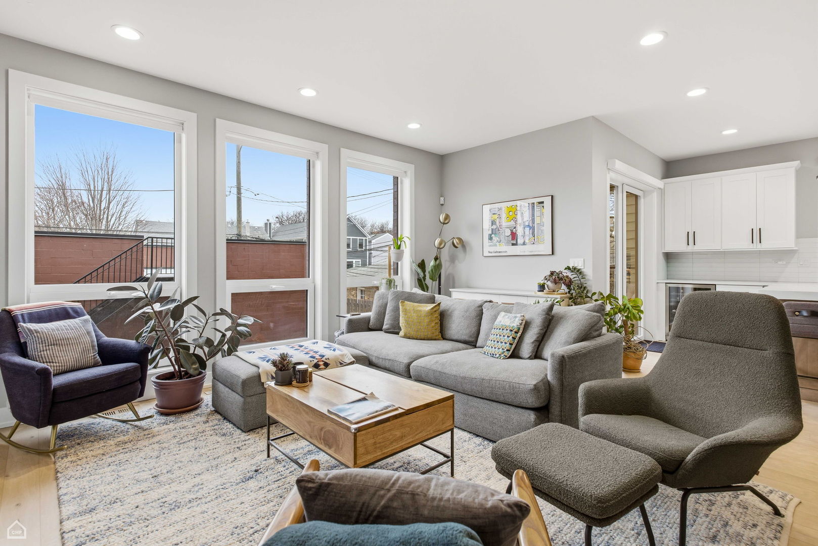 Undisclosed Address Chicago, IL 60625 - Photo 5 of 25 a living room with furniture or couch and a large window