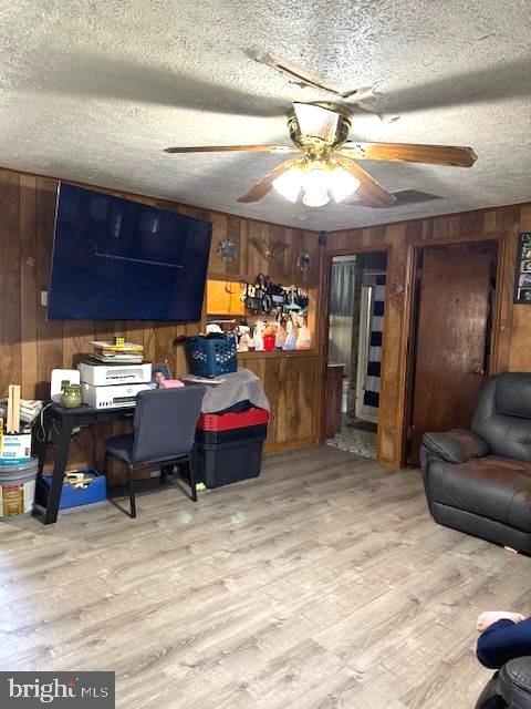 522 Mission Road Harpers Ferry, WV 25425 - Photo 12 of 14 a living room with furniture a flat screen tv and kitchen view