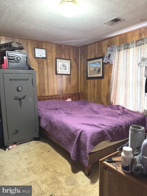 522 Mission Road Harpers Ferry, WV 25425 - Photo 9 of 14 a bedroom with a bed and wooden floor
