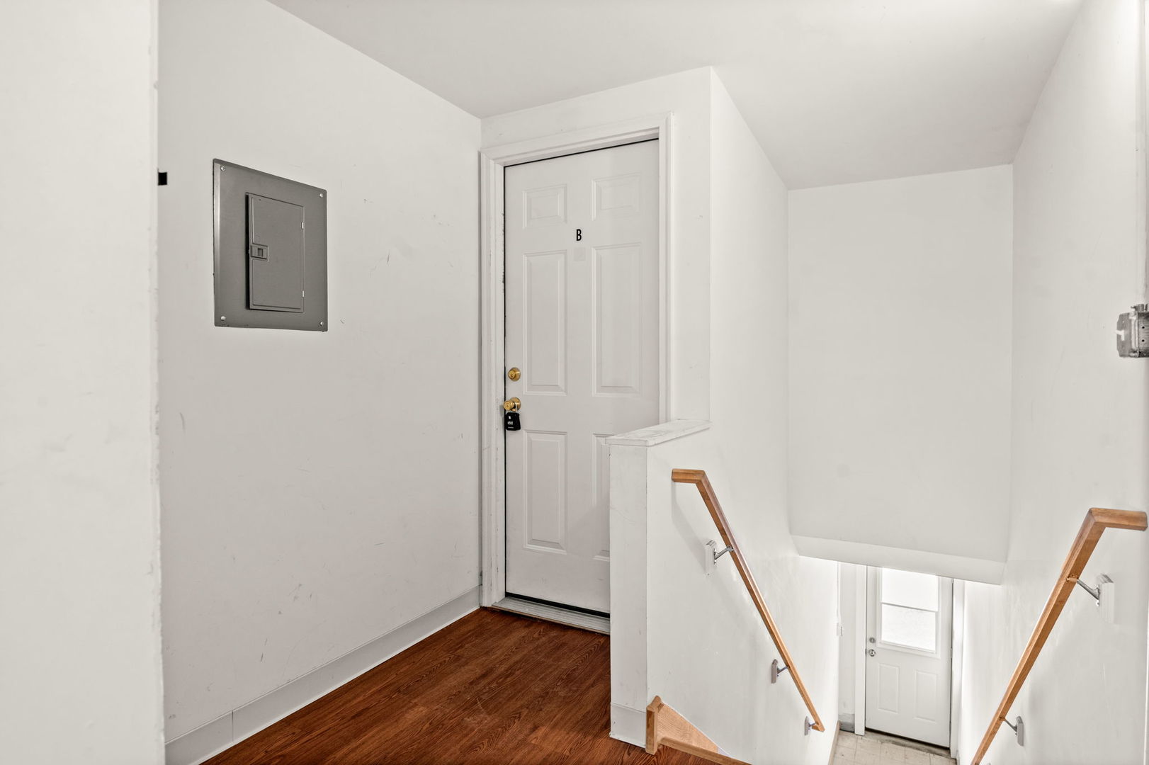 827 East Wilson Street, Unit B Batavia, IL 60510 - Photo 3 of 17 a view of an entryway with wooden floor