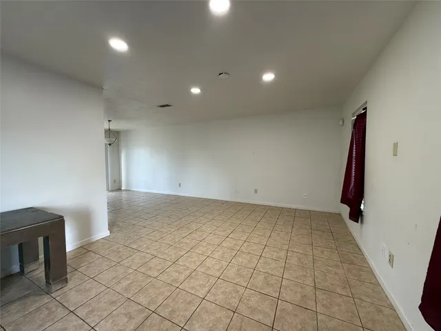 a view of a hallway with closet