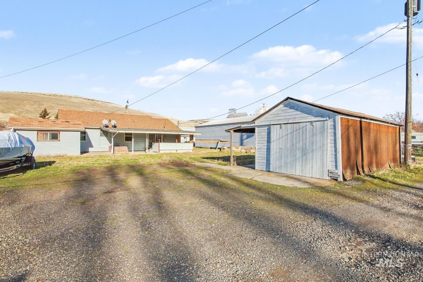 1830 Columbia Street Pomeroy, WA 99347 - Photo 25 of 28 Rear view of house with an outbuilding