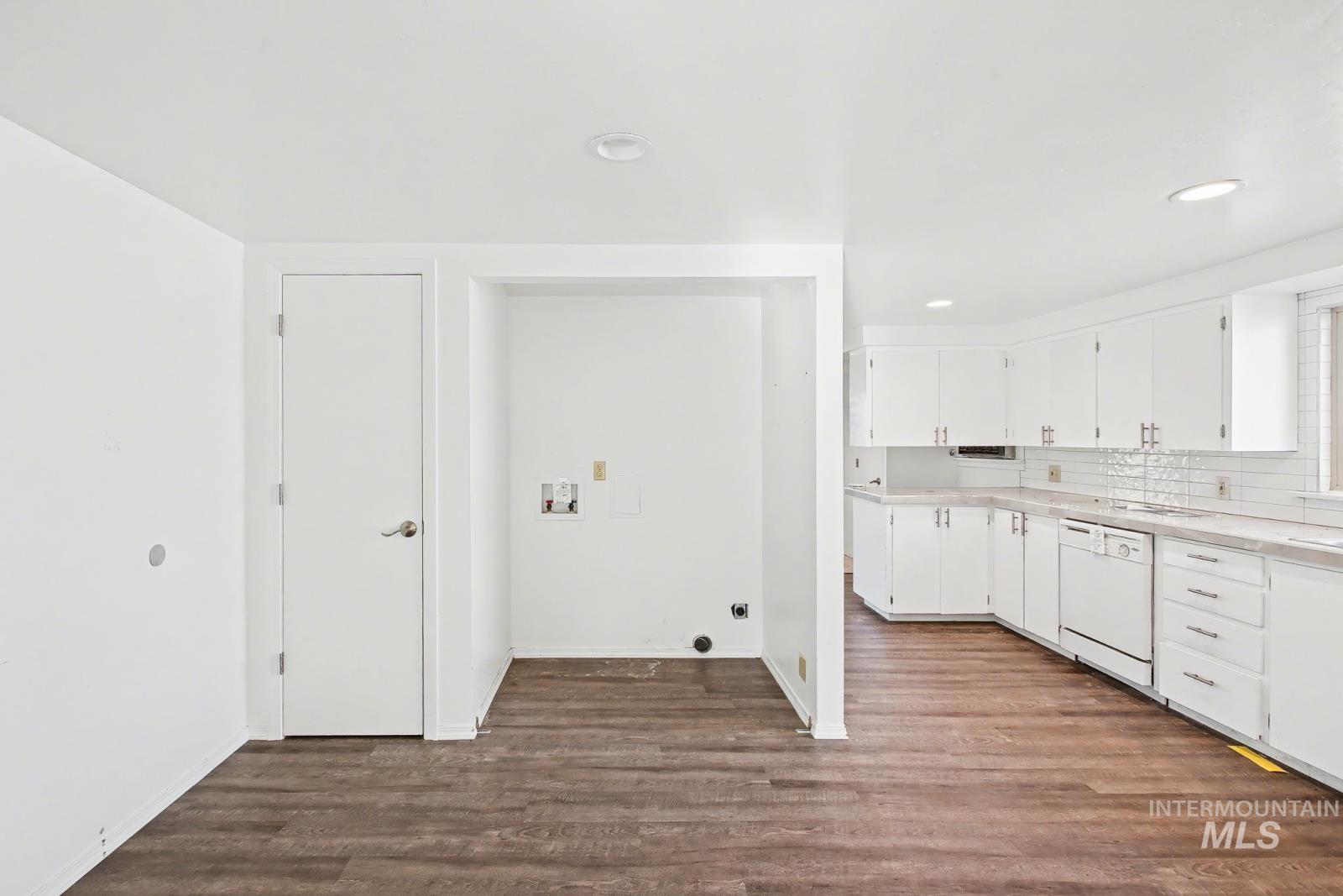 1830 Columbia Street Pomeroy, WA 99347 - Photo 10 of 28 Laundry room with dark wood-style flooring, washer hookup, and recessed lighting