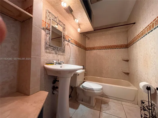 a view of a kitchen with a sink and dishwasher kitchen view