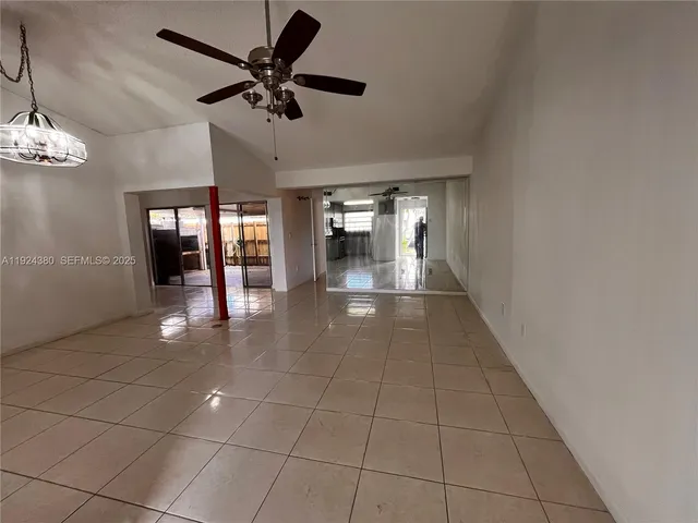 a view of an entryway with a chandelier