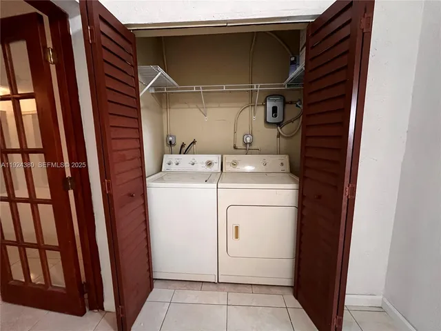 a view of a hallway with a window