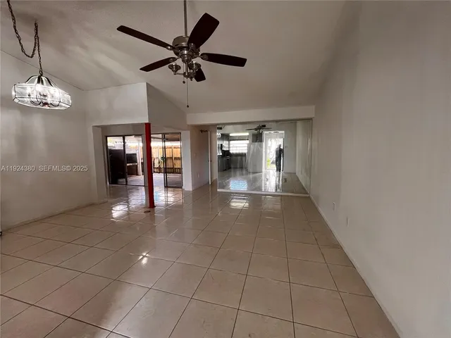 a view of a livingroom with a kitchen