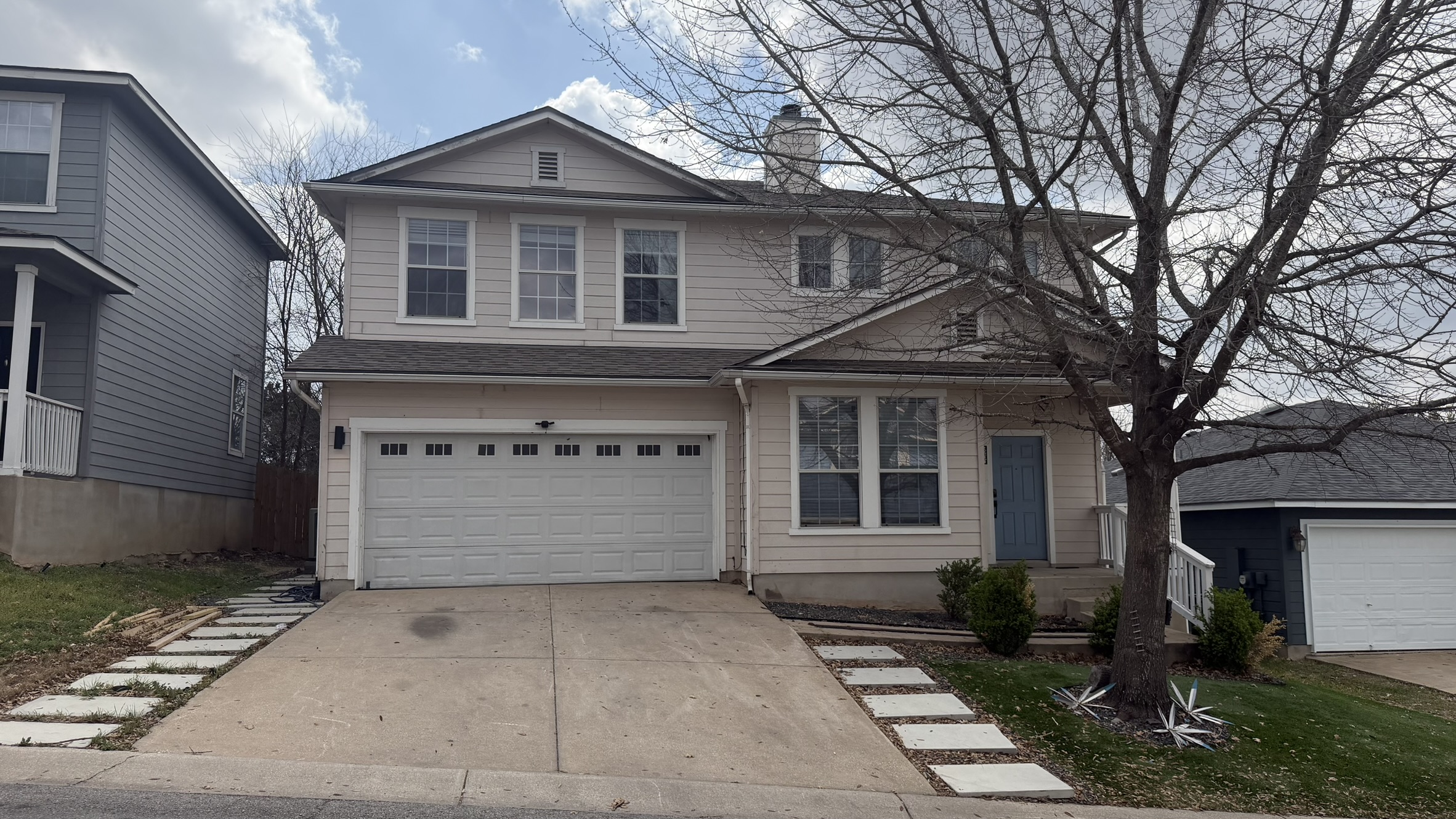 Undisclosed Address Austin, TX 78754 - Photo 1 of 1 a front view of a house with garden