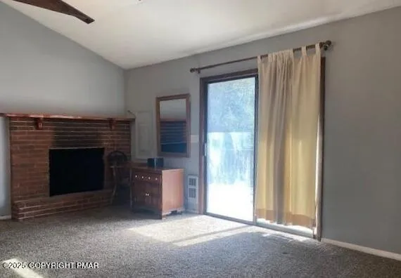 a view of a livingroom with furniture