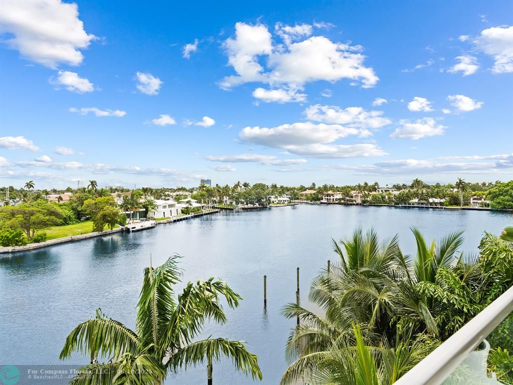 353 Sunset Drive, Unit 401 Fort Lauderdale, FL 33301 - Photo 15 of 43 a view of a lake from a balcony