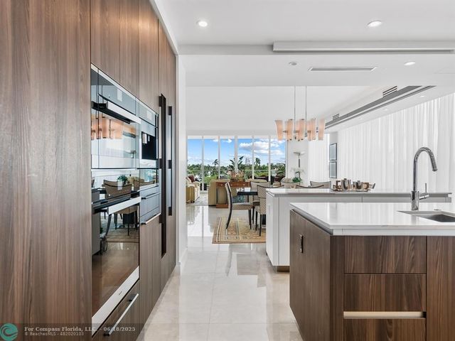 a bedroom with a bed and a night stand