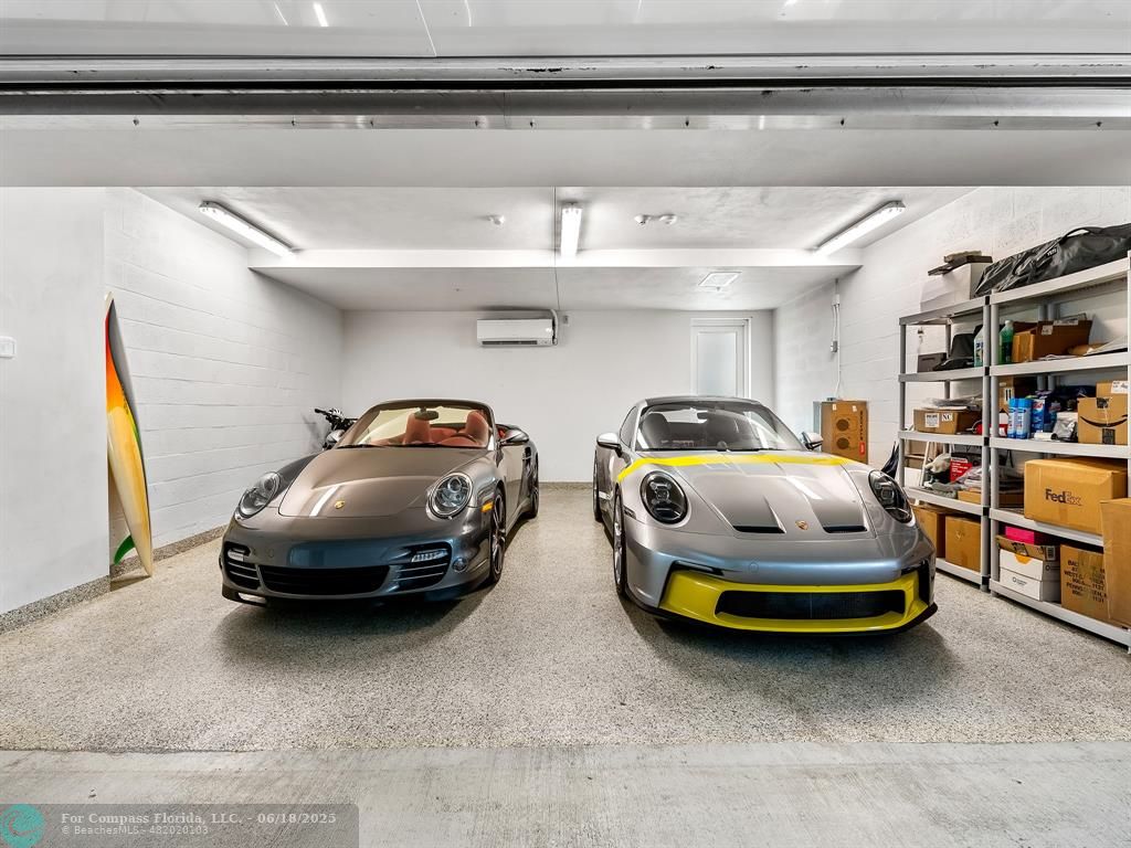 353 Sunset Drive, Unit 401 Fort Lauderdale, FL 33301 - Photo 37 of 43 a car parked in garage
