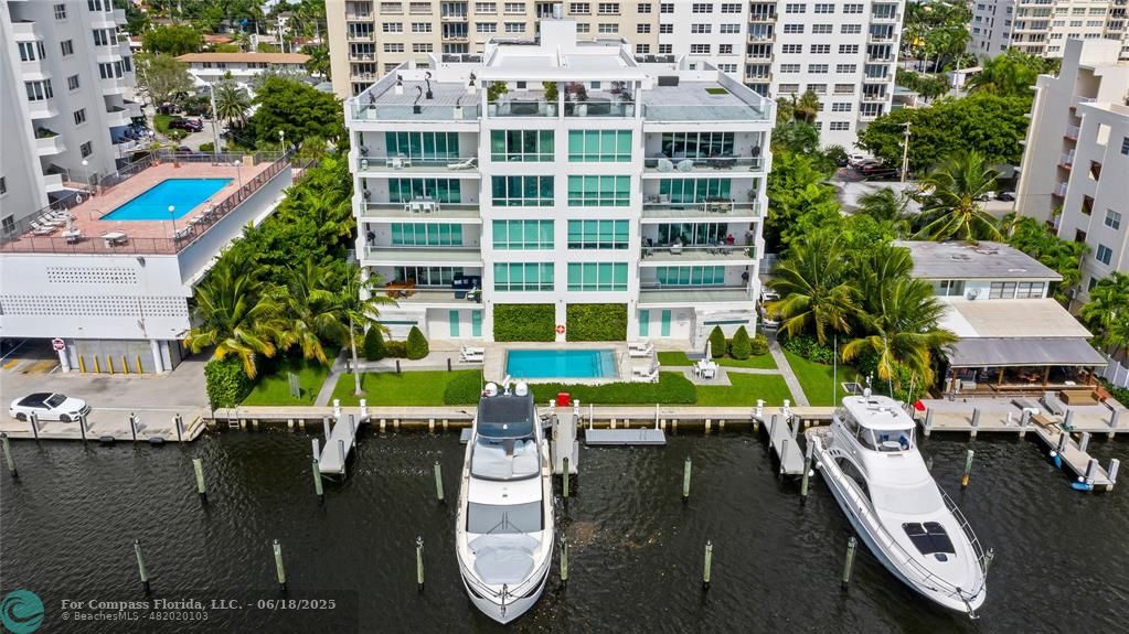 353 Sunset Drive, Unit 401 Fort Lauderdale, FL 33301 - Photo 5 of 43 aerial view of a house with a garden and patio